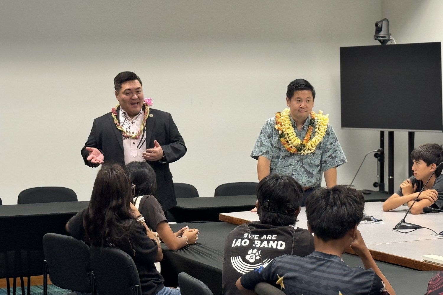 Tyson Miyake speaking with students in a classroom